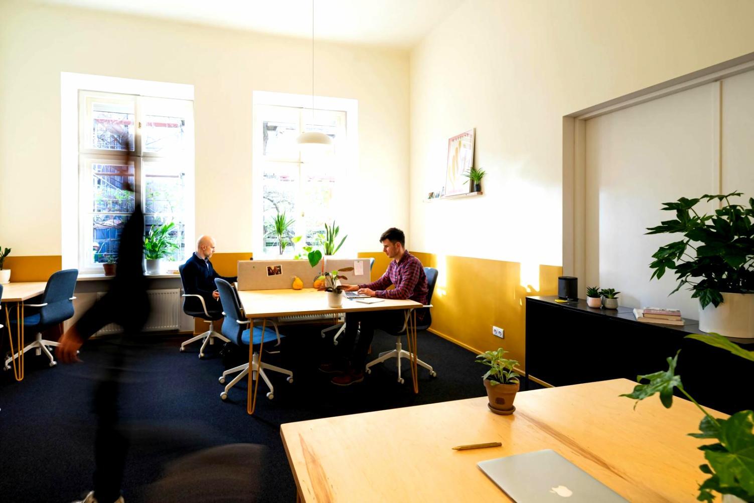 Financial documents and analysis tools spread on desk